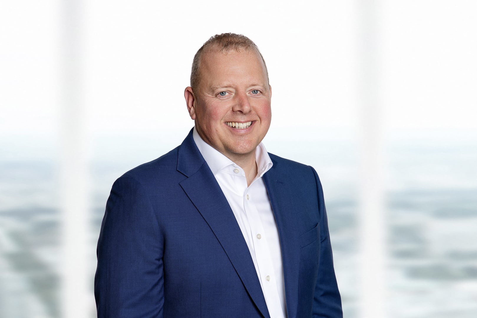 Jon Arnold, new Chief Commercial Officer at Pulsant, is pictured in a white shirt and blue suit