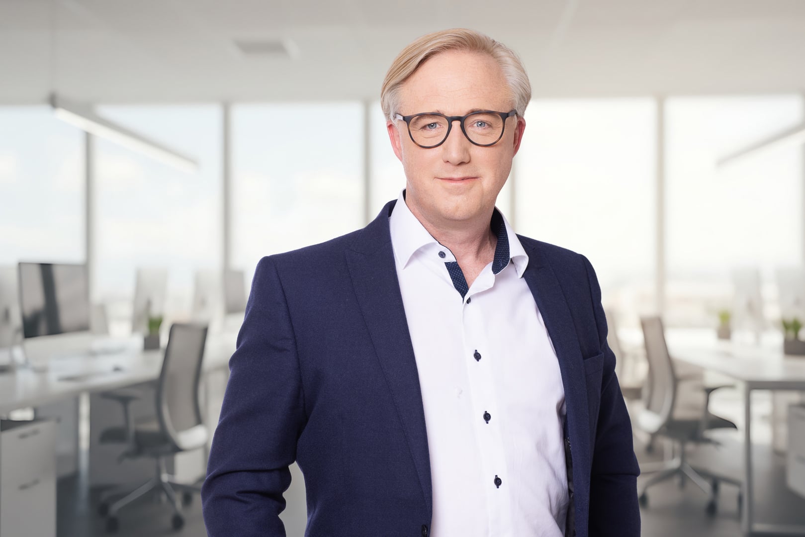 Mark Lewis, CMO at Pulsant, in an office.